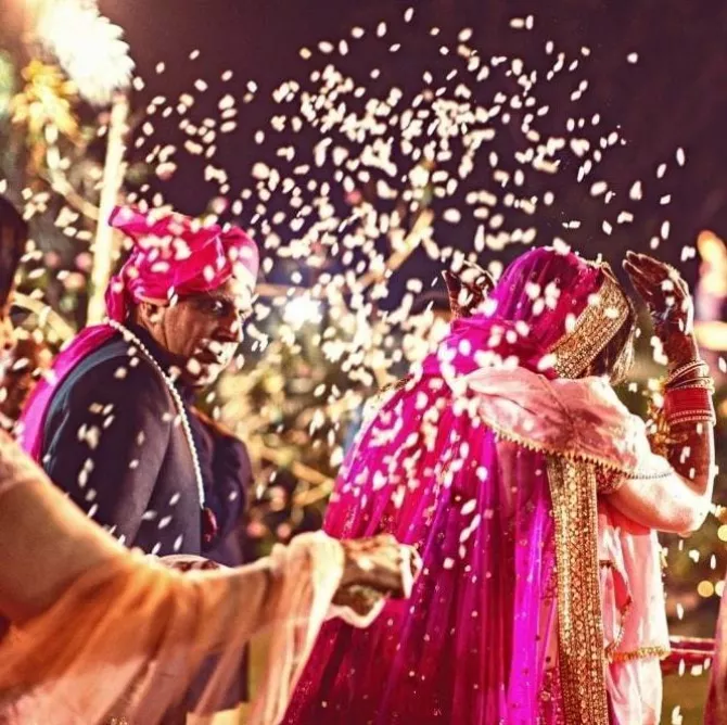 The Reason Behind An Indian Bride Throwing Rice During Her 'Vidaai' Is