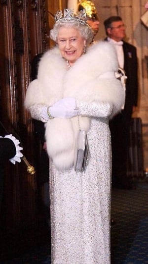 Queen Elizabeth II's Iconic Dresses And Hats 
