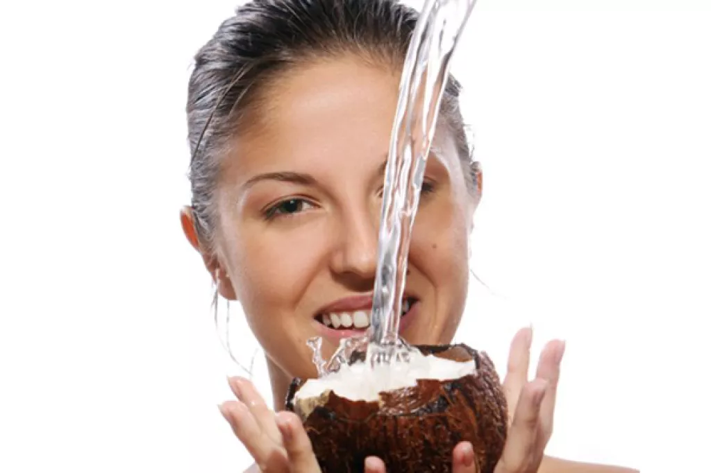 8 Amazing Beauty Benefits Of Coconut Water For Glowing Skin and