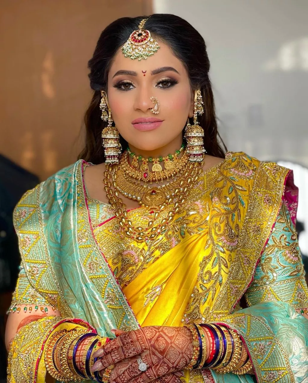 Bride Wore A Gorgeous Yellow Hued Nauvari Saree For Her Wedding Day 