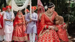 Sabyasachi Bride Slays In A Red Zari-Embroidered Lehenga, Clads Her Fur Baby In A Matching Jacket
