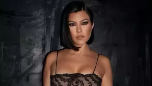 Kourtney Kardashian Turns The Iconic 'Travis I'm Pregnant' Concert Sign Into A Framed Home Decor