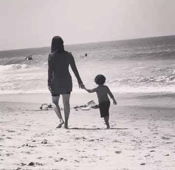 Sunny Leone takes her son, Noah for a walk on the beach
