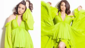 Surveen Chawla Makes The World Go Green With Envy As She Flaunts Her Baby Bum On The Red Carpet