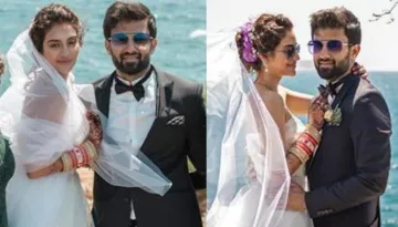 Nusrat Jahan Looks Mesmerising In A White Gown As She Walks The Aisle In Her Destination Wedding