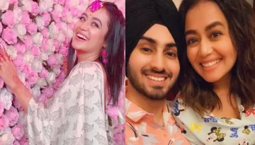 Neha Kakkar And Rohanpreet Posing With Family For A Picture Hints At Their Roka Amid Wedding Rumours