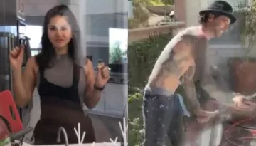 Sunny Leone's Husband, Daniel Weber Cleans The Windows While His Darling Wife  Eats Chocolates