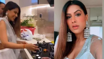 Nia Sharma Buys A New Home, Performs 'Griha Pravesh' For Her Pristine White, Mirror Finish Abode