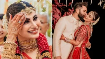 Mouni Roy Flaunts 'Sindoor' In A Red Banarasi Saree As Spotted At Airport With Husband Suraj Nambiar