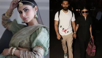 Mouni Roy Papped At The Airport With Hubby, Suraj Nambiar, Carries A Tote Bag Worth Rs. 2.19 Lakh