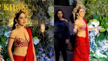 Urfi Javed Dons A Hot Red Saree With Nude Red-Stone Embellished Blouse At AJSK's Party
