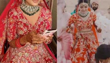 Anamika Khanna Bride Stuns In A Tomato Red Lehenga Heavily Encrusted With Stones In Floral Patterns