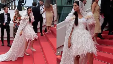 Sapna Choudhary Dons A White Feather Dress, Pairs It With An Embellished Hood At Cannes 2023