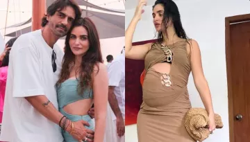 Arjun Rampal's GF, Gabriella Demetriades Flaunts Her Baby Bump In A Sultry Maxi Dress Worth Rs. 33K