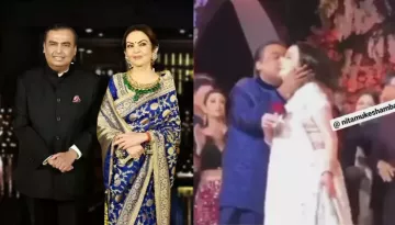 Mukesh Ambani Romances And Cutely Kisses His Wife, Nita Ambani While Dancing With Her On Stage