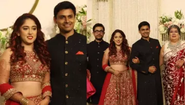 Ira Khan Looks Gorgeous In A Red Lehenga For Her Grand Reception, Poses With Dad, Aamir Khan