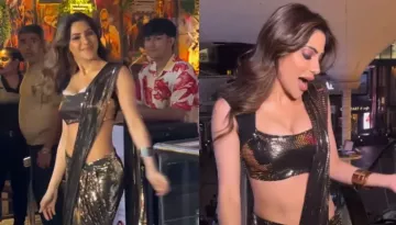 Nikki Tamboli Steals Limelight In A Thigh-High Slit Metallic Saree At Divya-Apurva's Cocktail Party