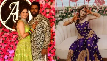 Arti Singh Stuns In A Royal Purple 'Sharara', Flaunts Her 'Mehendi', Poses Mushily By The Beachside