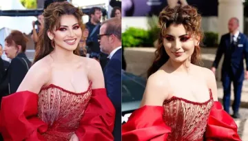 Urvashi Rautela Dons A Red Dramatic Gown For Day 2 Of Cannes 2024, Gets Slammed For Her Low Neckline