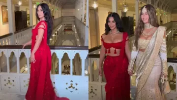Kim Kardashian Stuns In Red Sequinned Lehenga, Khloe Opts For Beige-Hued Lehenga With Sunglasses