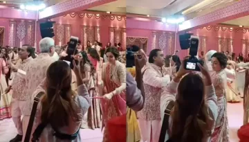 Nita Ambani Gracefully Plays 'Dandiya' With Husband, Mukesh Ambani And 'Samdhi', Viren Merchant