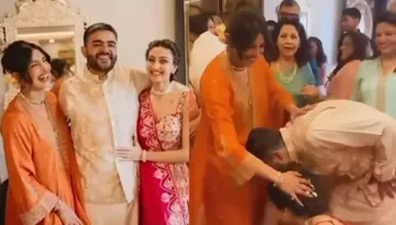 Priyanka Chopra Stuns In Orange Kurta Set As Brother, Siddharth Touches Her Feet To Seek Blessings