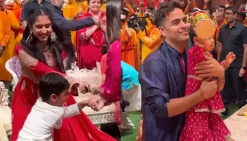 Akash Ambani's Daughter, Veda Plays 'Damru', Son, Prithvi Does 'Kikli' With Radhika During Ganpati