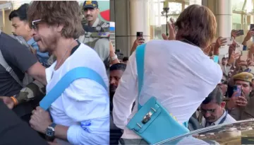 IIFA Awards 2025: SRK Lands In Jaipur, Dons Rs.11.70 Lakh Bag, Fans Go Crazy As He Gives Flying Kiss