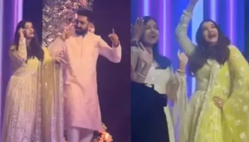 Aishwarya Rai Gives Cues To Abhishek Bachchan As They Dance On 'Kajra Re' With Aaradhya At Wedding