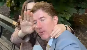 Married 45-Yr-Old NYC Lawyer Caught Kissing 29-Yr-Old Co-Worker, Suspended, Lost New Job Offer