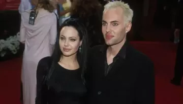 Angelina Jolie Revealed Parents' Reaction To Her And Brother's Controversial Lip Kiss At The Oscars