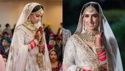 The Sabyasachi Bride Dazzled In A White-Hued Lehenga Adorned With 'Moti' And Muti-Coloured 'Zari'