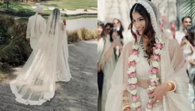 Bride Grabs Eyeballs In An Ivory-Hued Lehenga Featuring Long Veil And Crystal Designs On Her D-Day