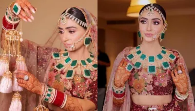  Sabyasachi Bride Wore A Maroon Lehenga, Paired It With Unique Emerald Jewellery And Tassle 'Kaleera'   