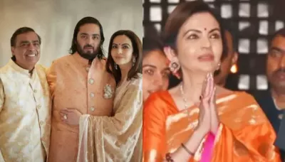  Nita Ambani Looks Resplendent In Orange Silk Saree Paired With Red 'Bindi' And 'Gajra'-Adorned Hair   