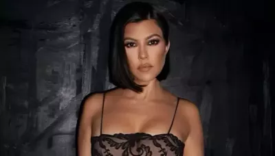  Kourtney Kardashian Turns The Iconic 'Travis I'm Pregnant' Concert Sign Into A Framed Home Decor   
