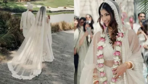 Bride Grabs Eyeballs In An Ivory-Hued Lehenga Featuring Long Veil And Crystal Designs On Her D-Day