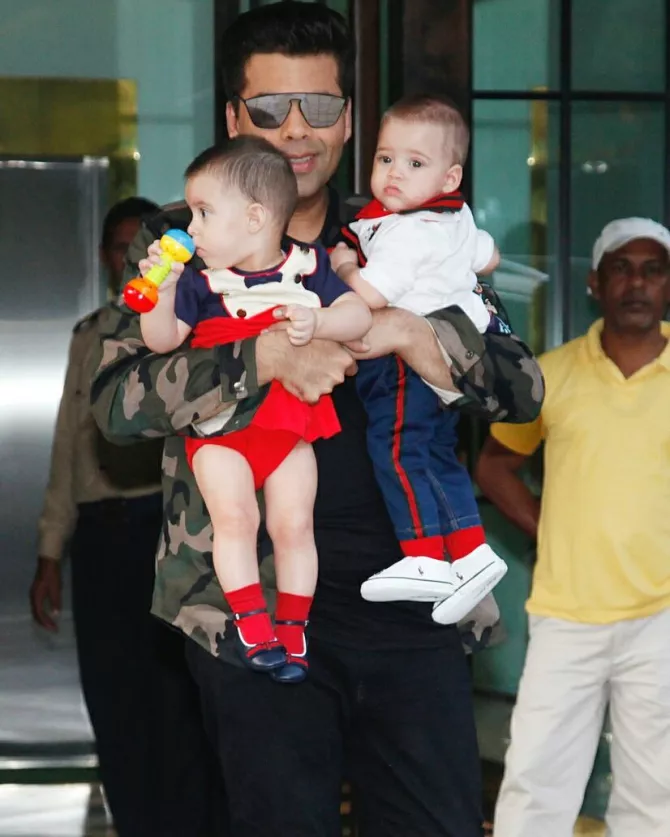 Karan Johar, Yash Johar and Roohi Johar
