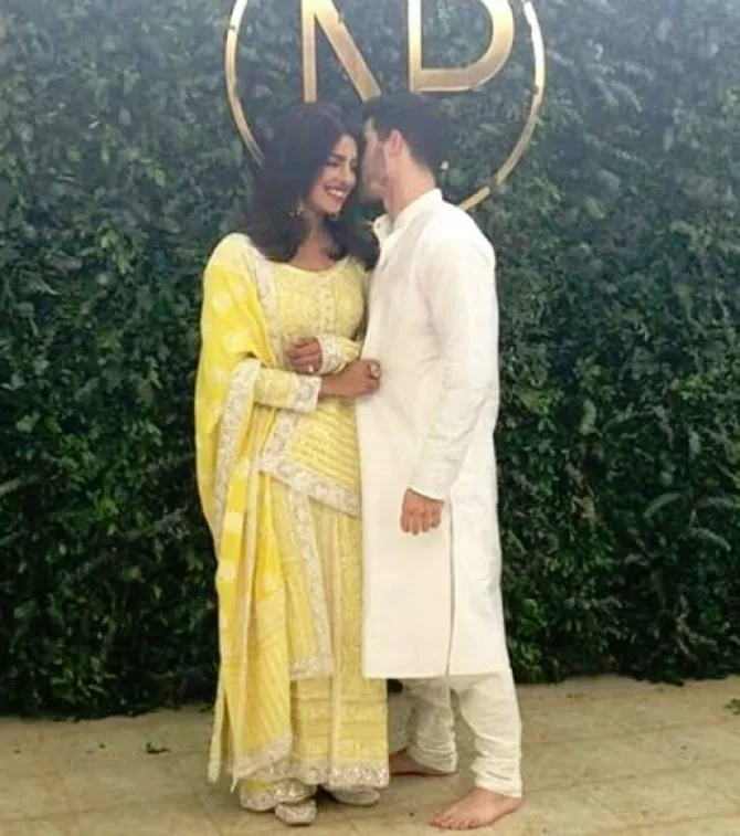Priyanka chopra and nick Jonas doing puja at their roka ceremony
