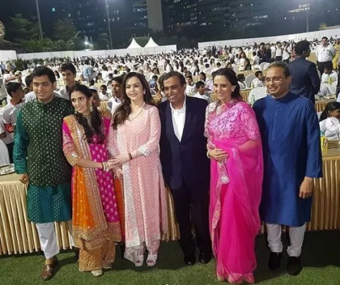 Akash and Shloka at Anna Seva with family