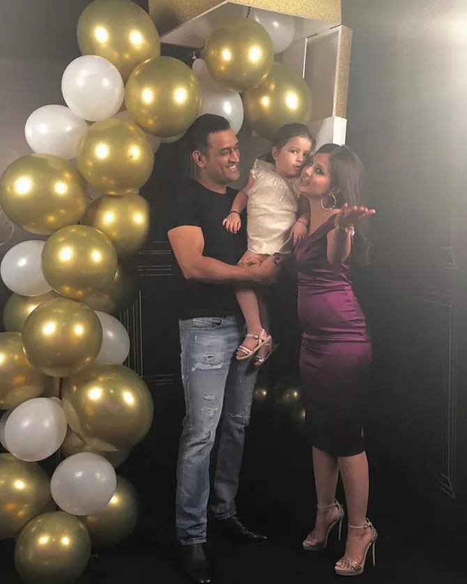 Mahendra Singh Dhoni, Sakshi Singh Dhoni and Ziva Singh Dhoni
