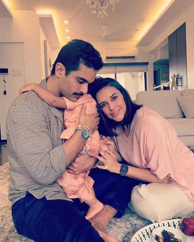 Neha Dhupia, Angad Bedi and Mehr Dhupia Bedi