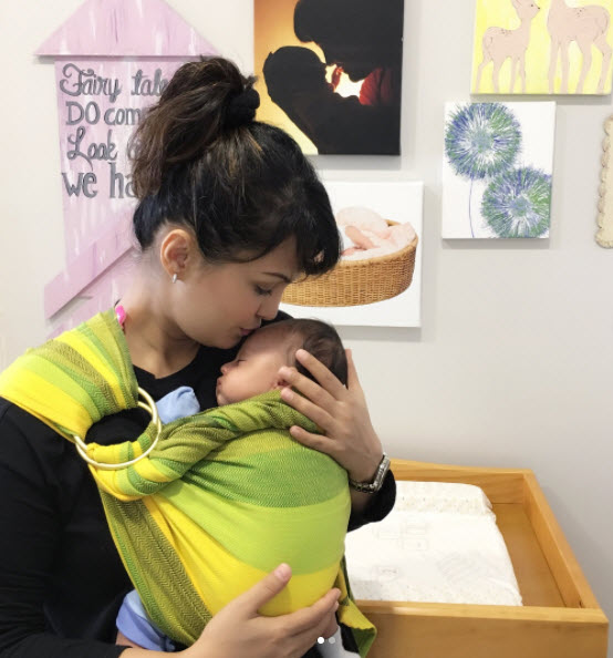 Nisha Rawal with her baby