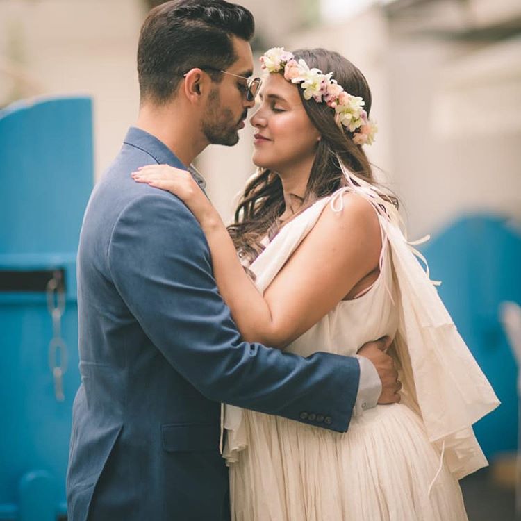 Angad Bedi Holds Pregnant Neha Dhupia Hands