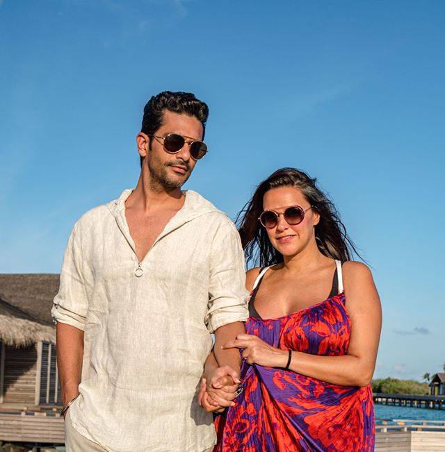Angad Bedi Holds Pregnant Neha Dhupia Hands