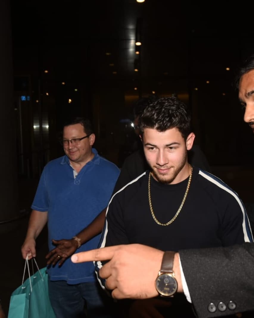 Nick Jonas Arrives In Mumbai With His Parents