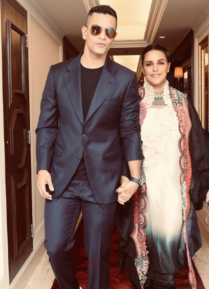 angad bedi and neha dhupia with daughter