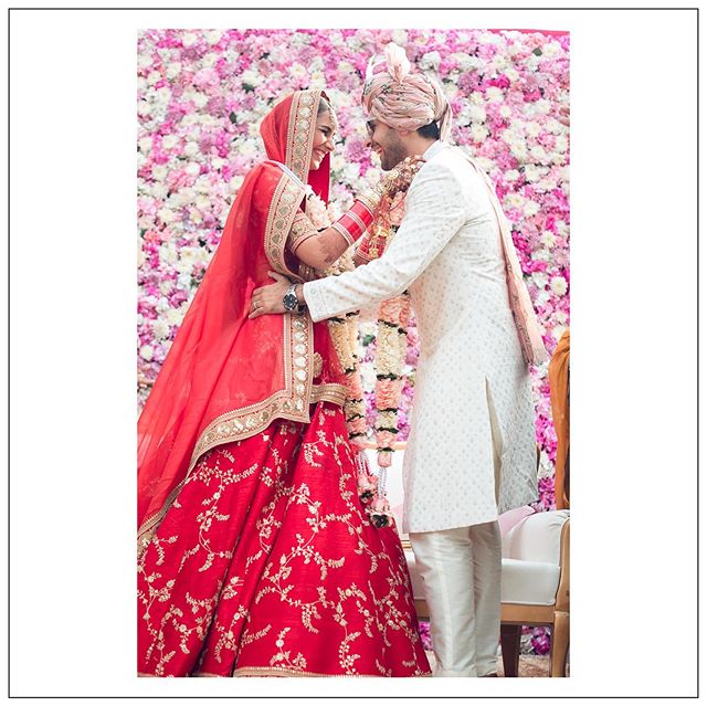 Hasleen Kaur red Sabyasachi lehenga