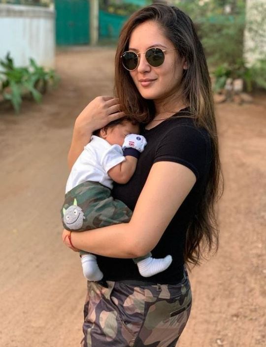 Puja Banerjee with her baby boy