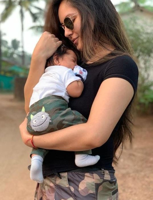 Puja Banerjee with her baby boy